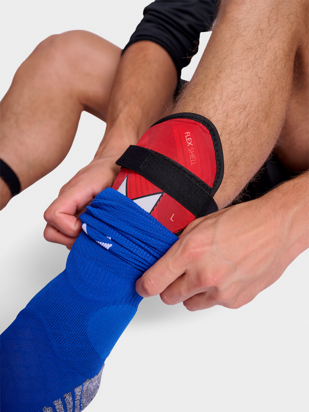 Espinilleras Hummel Flex Shell