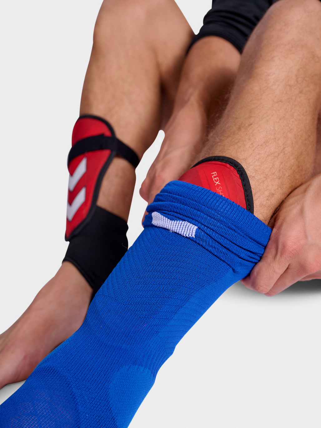 Espinilleras Hummel Flex Shell