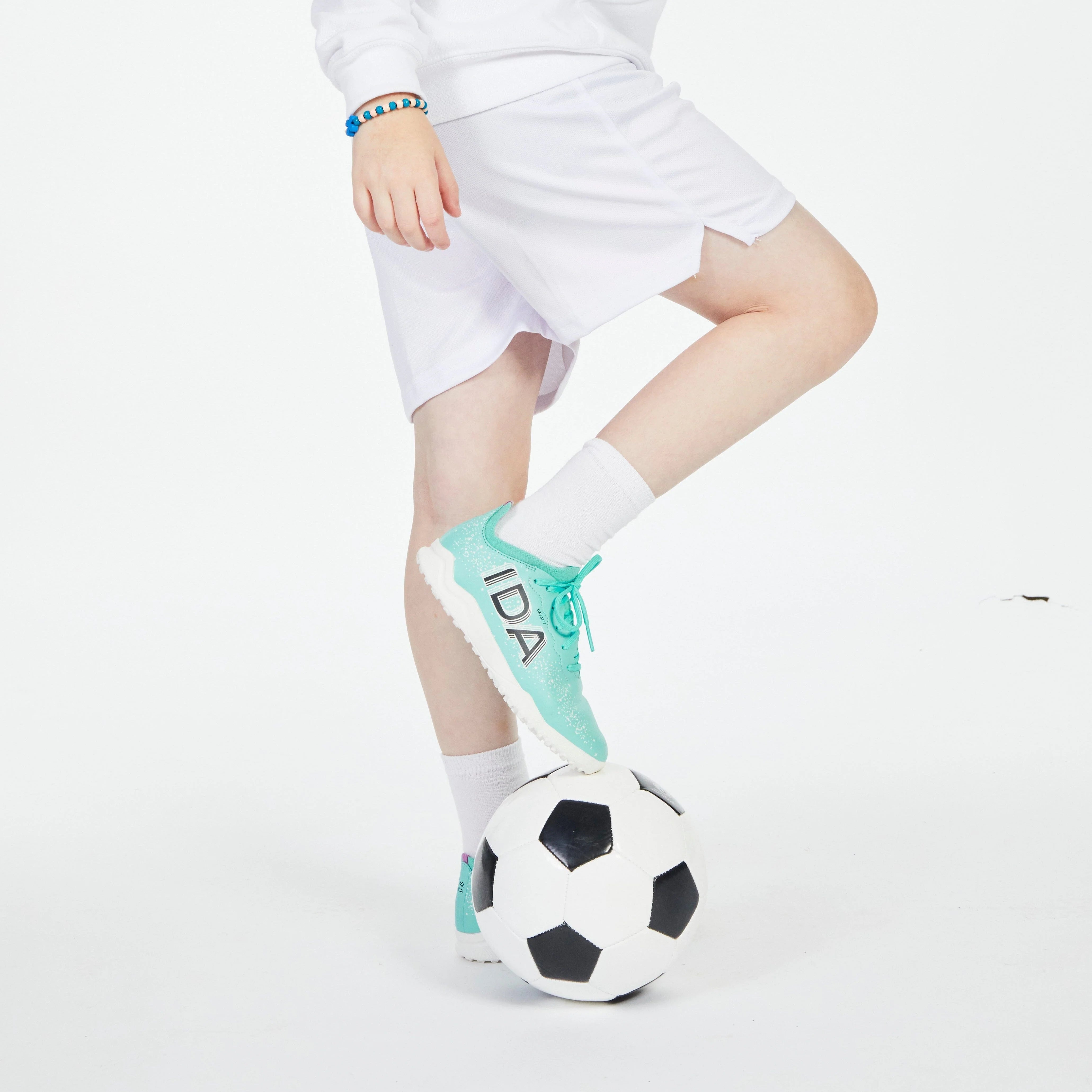 Zapatillas de fútbol sala para niña IDA Youth Travel (verde azulado)